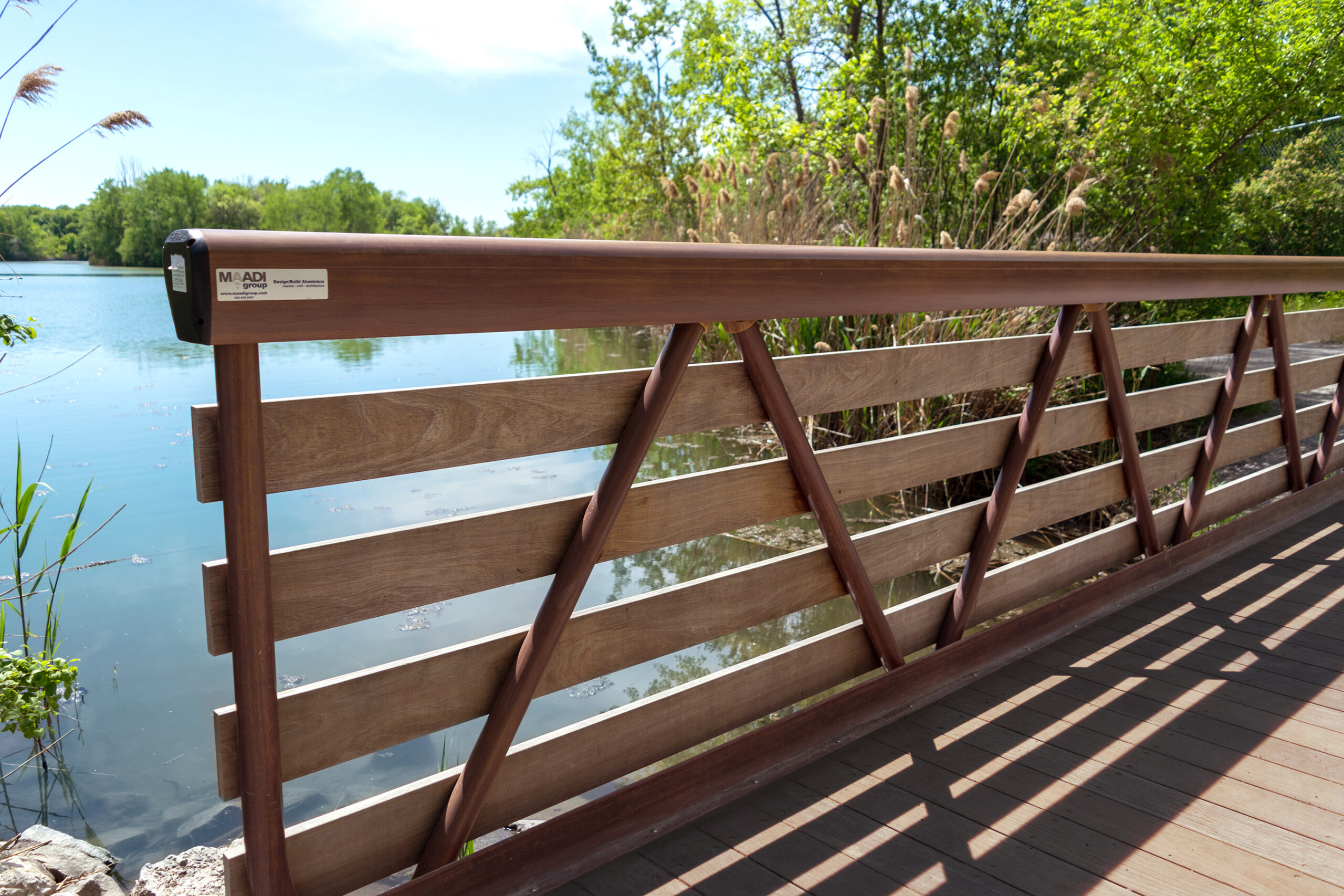 Aluminum guardrail with faux-wood finish