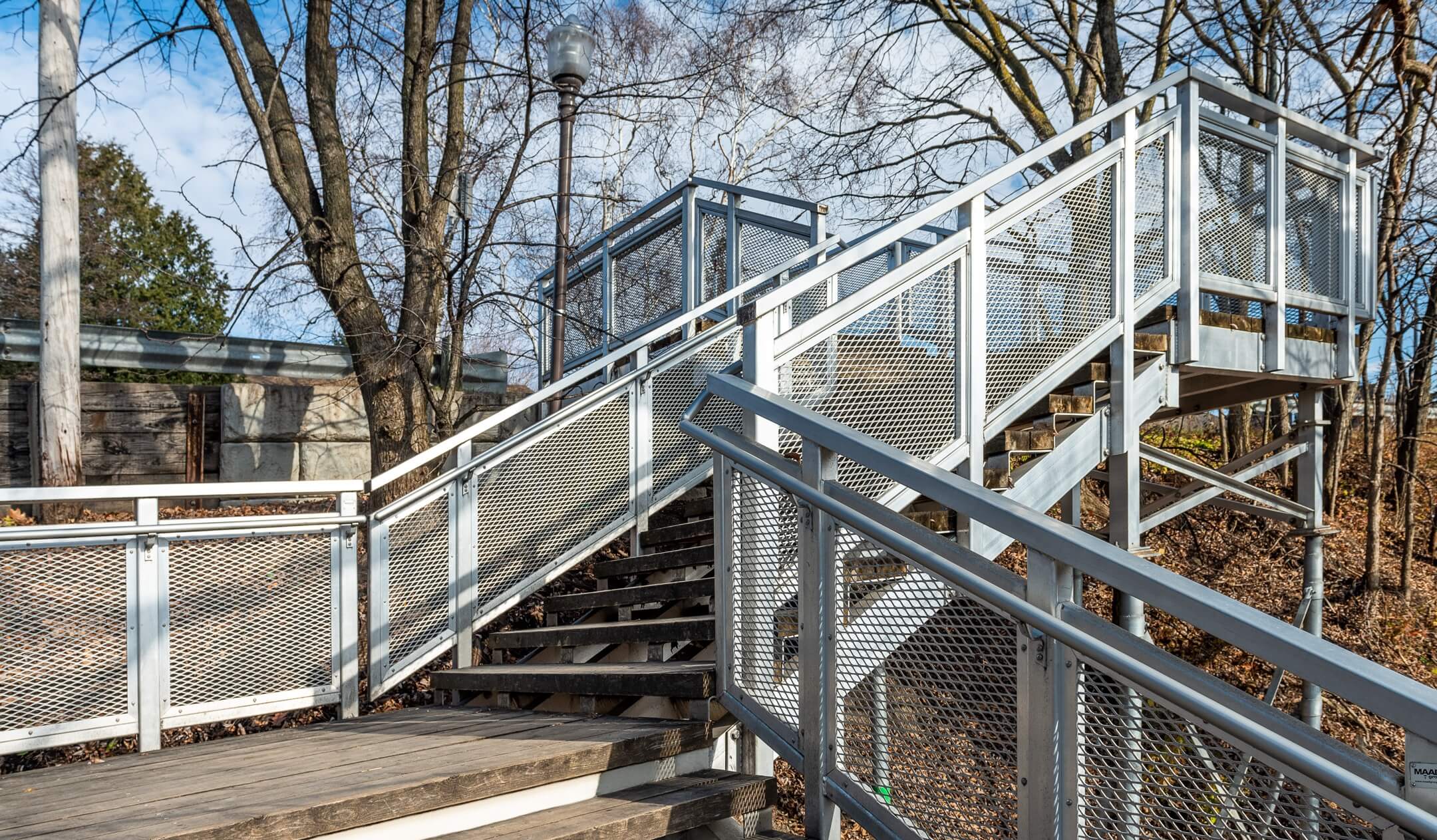 Custom aluminum outdoor staircase with wood decking