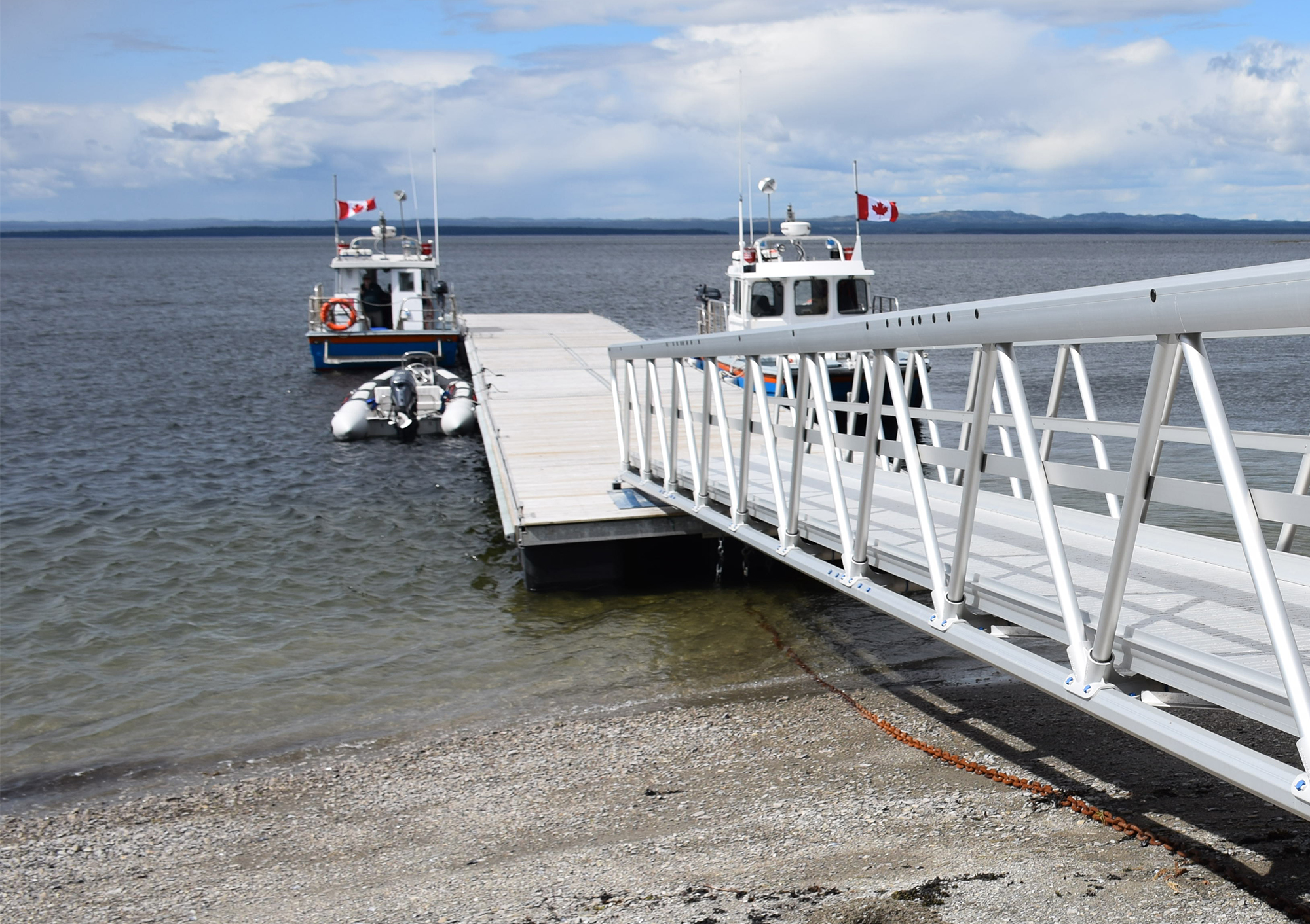 Gangway kit leading to floating dock at Mingan Archipelago National Park Reserve in Canada