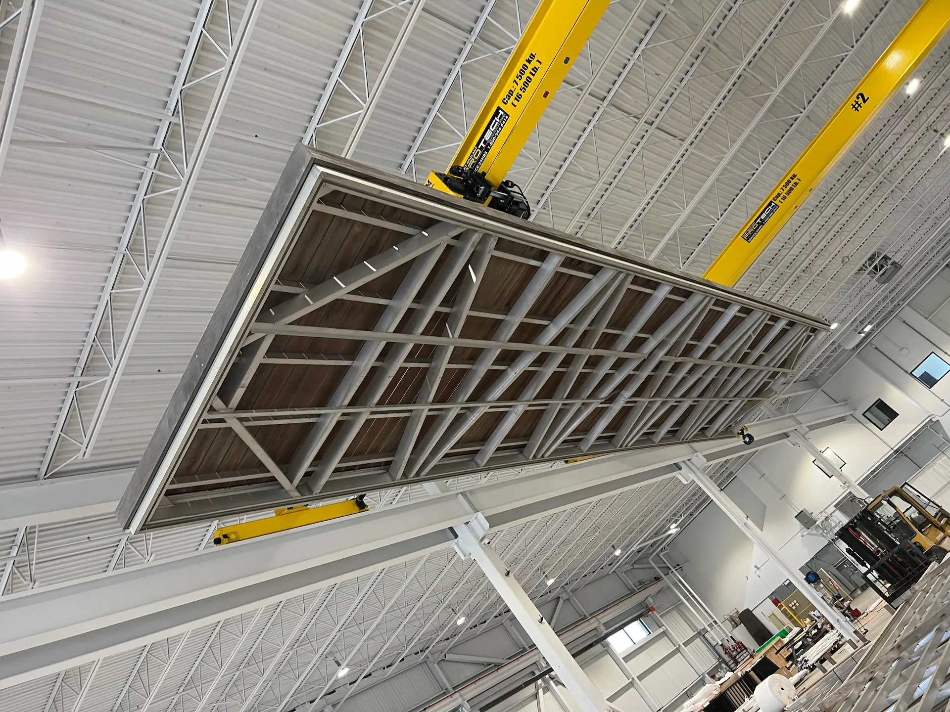 Aluminum dock frame in MAADI Group’s workshop, illustrating how aluminum avoids chemical runoff and creates safer waterways for fish, plants, and people.