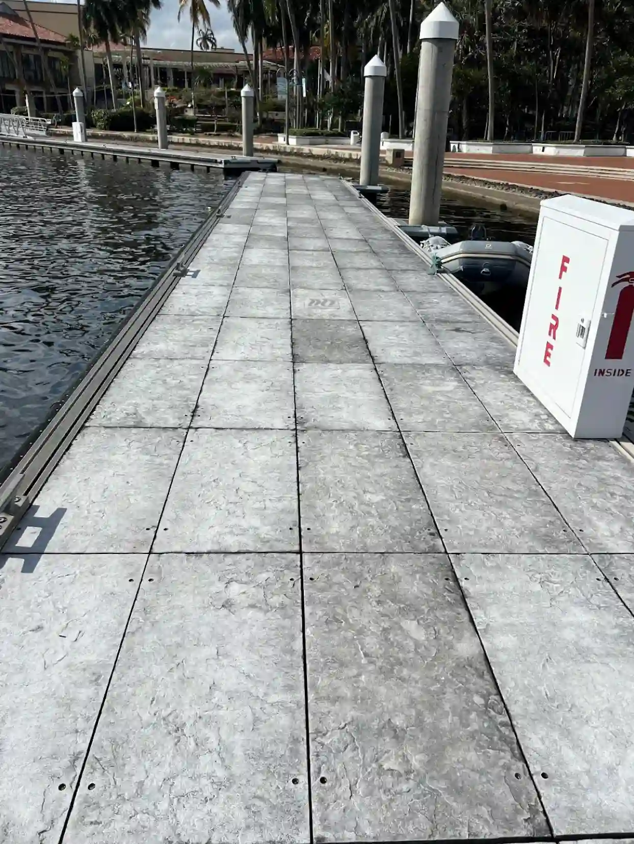 Concrete marina deck tiles on floating dock
