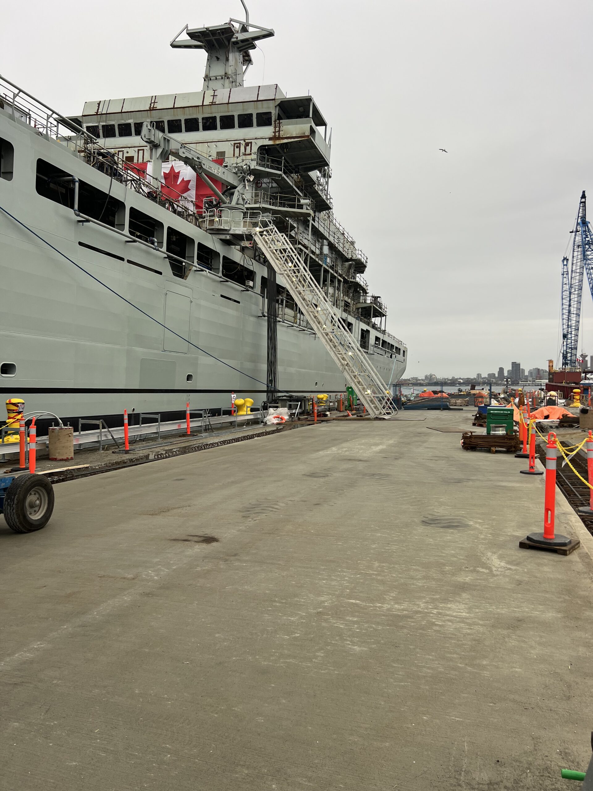 Vessel access gangway serving port infrastructure